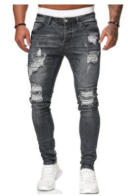Image of Ripped white denim trousers