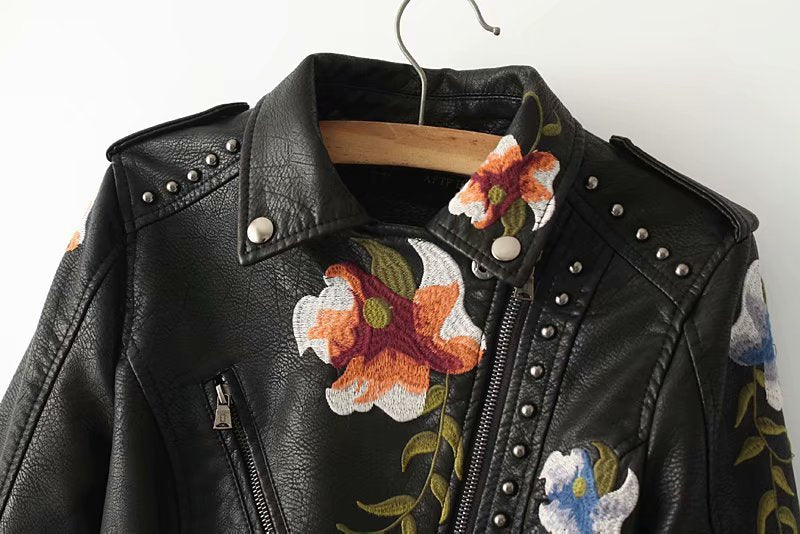 Image of Embroidered studded leather jacket