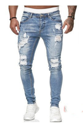Image of Ripped white denim trousers