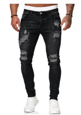 Image of Ripped white denim trousers