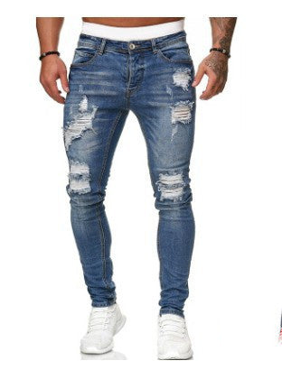Image of Ripped white denim trousers