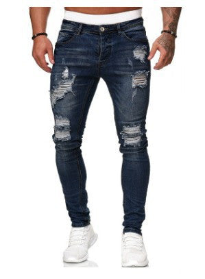 Image of Ripped white denim trousers